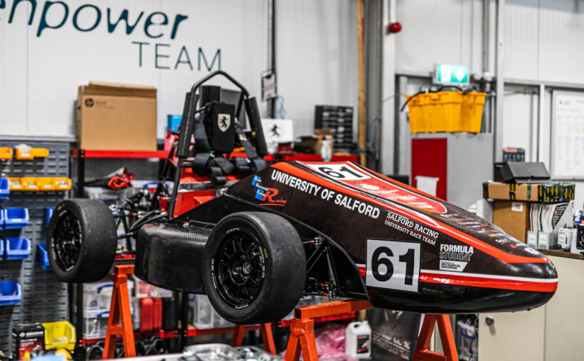 Formula Student Car with university of salford logo on it