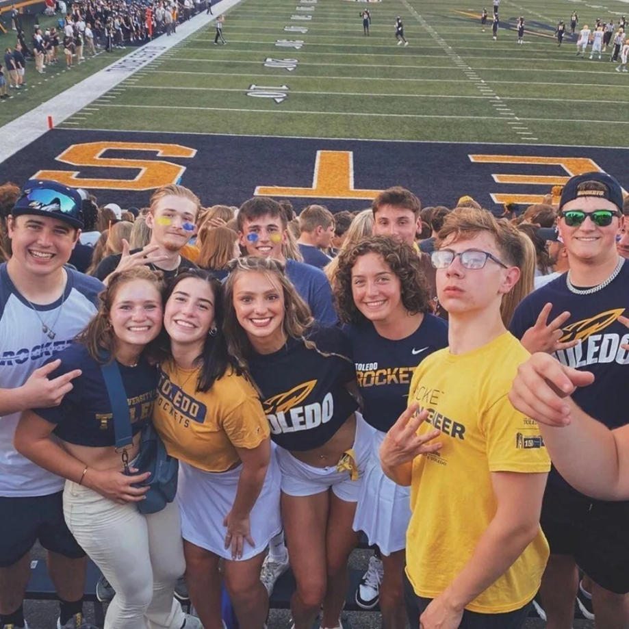 Peter and classmates at University of Toledo game