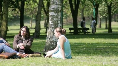 Students sat in Peel Park