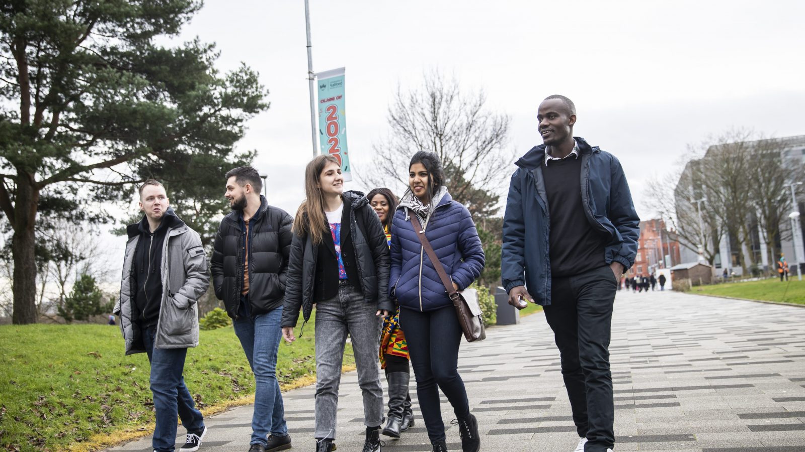 University of Salford international student walking through campus