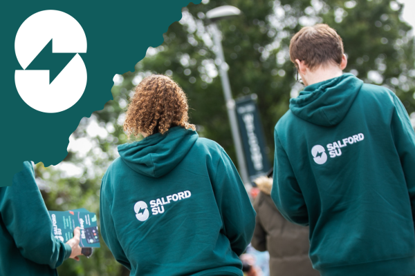 Two members of the SU walking on campus