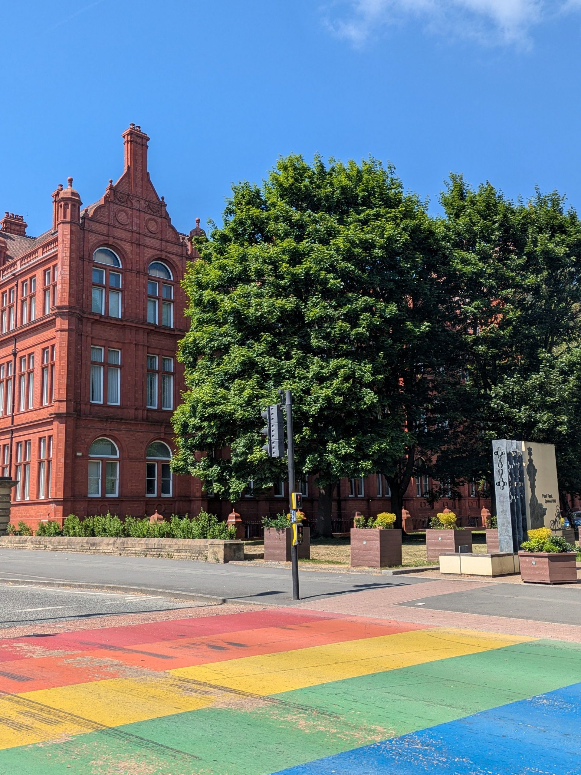 The rainbow crossing on Peel Park Campus with the Peel Building in the background.