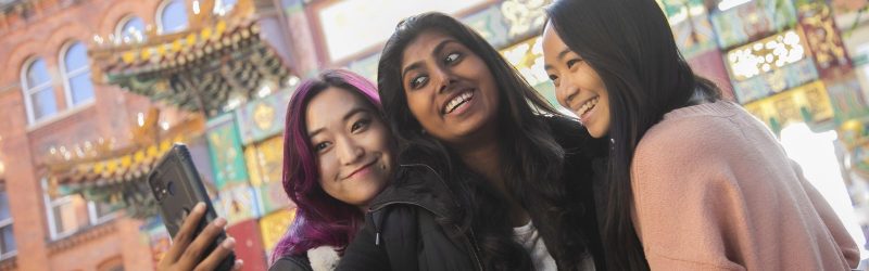 Students posing in Chinatown