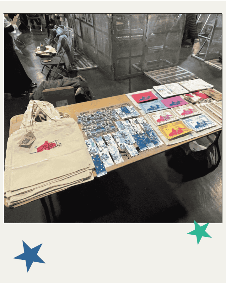 Student made merch including tote bags and prints