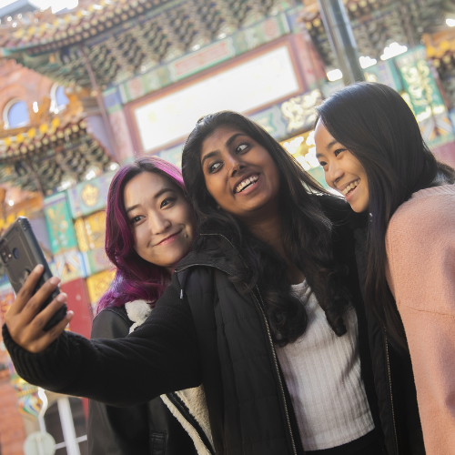 Three students taking a selfie