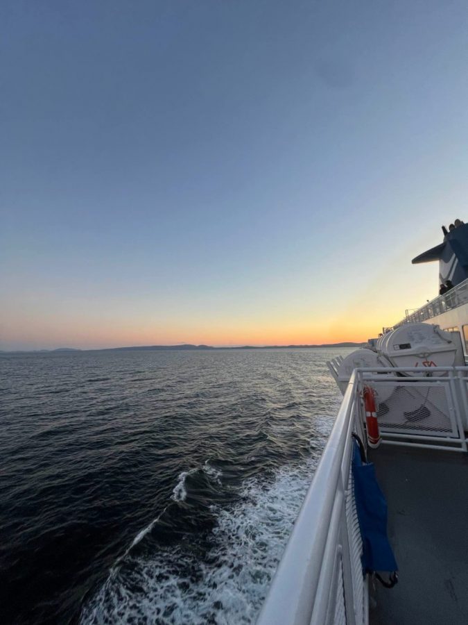 View from a boat of sunset and water