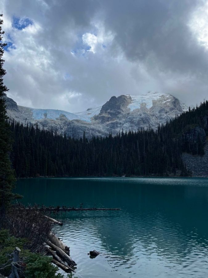 Lake and mountains in Canada with a moody, grey sky
