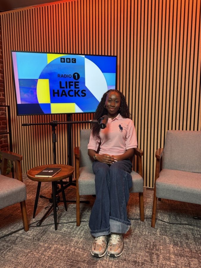 Student sat in chair at BBC Radio