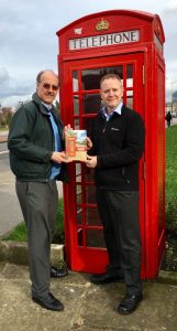 Profs Nigel Linge and Andy Sutton by phonebox